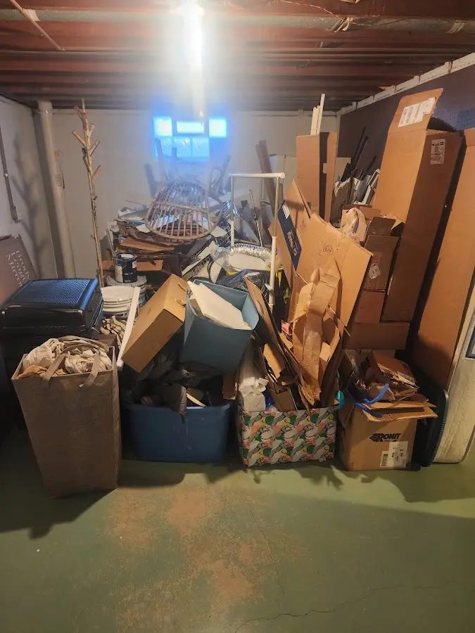 Roll-off dumpster container at job site for 4 Yard Dumpster Rental in Woodstock